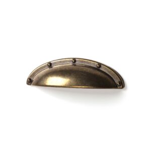 TIRADOR DE MUEBLE TIPO CONCHA, MODELO 2004, DE ZAMAK CON ACABADO CUERO VIEJO, 64 mm, BLISTER 4 uds